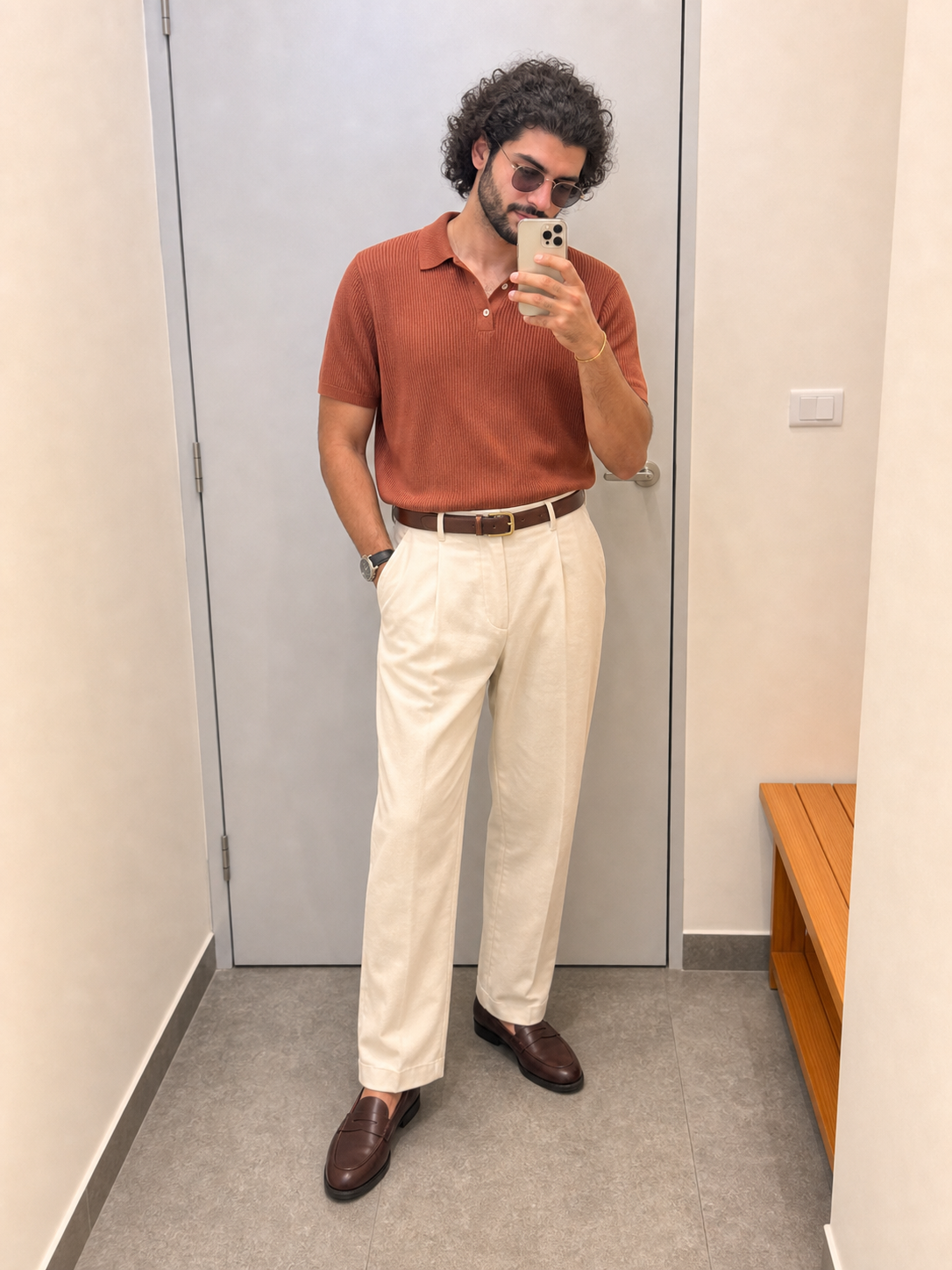 Generated outfit 172: terracotta knit polo cream trousers