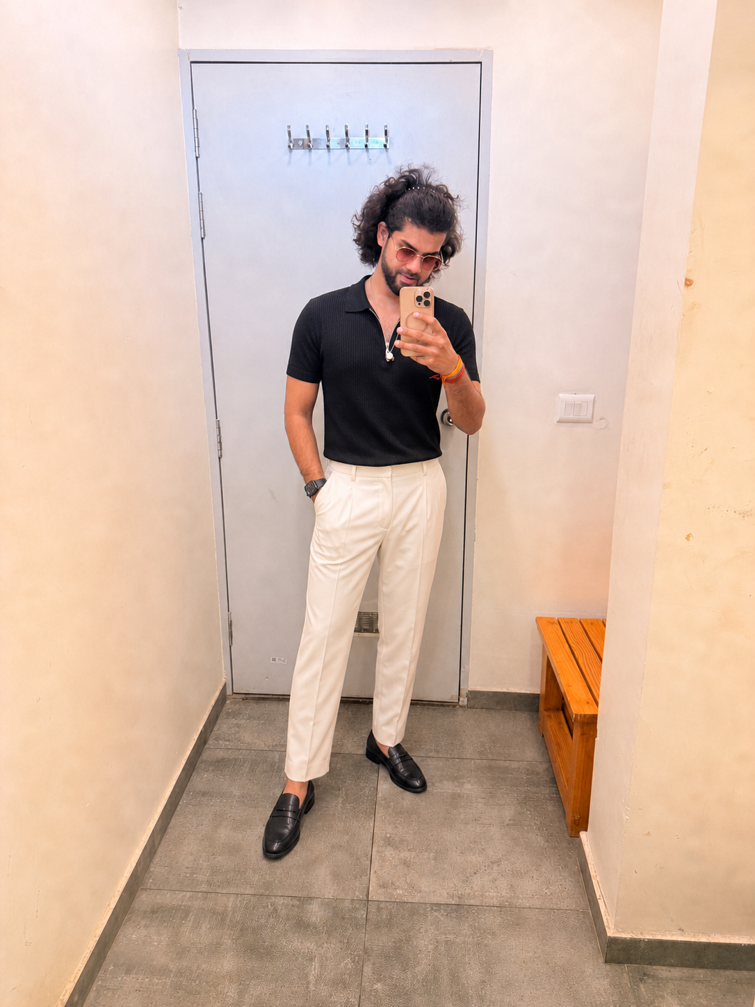 Generated outfit 54: black zip polo cream trousers